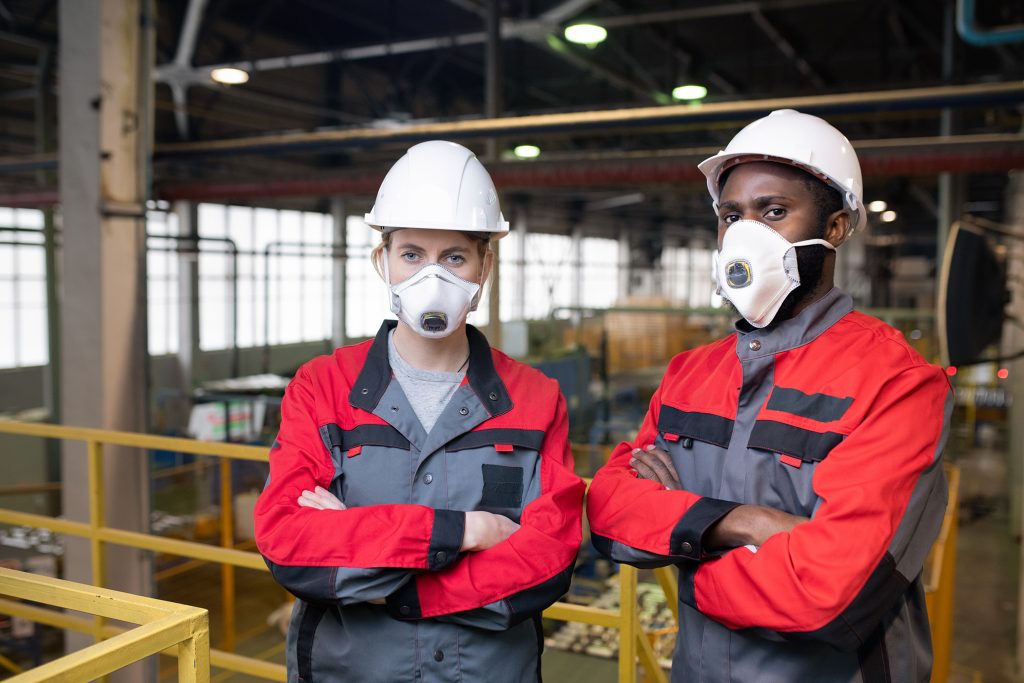 Workers in respiratory masks